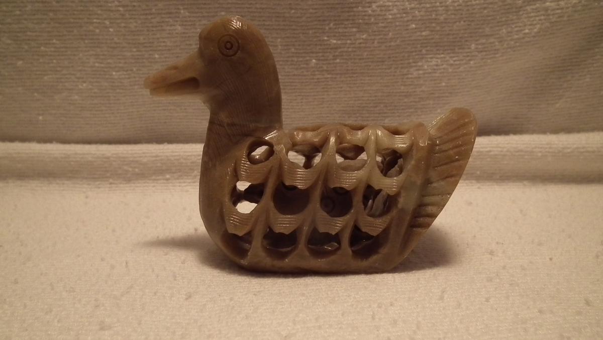 Soapstone duck w/ baby duck inside, 3”x4”