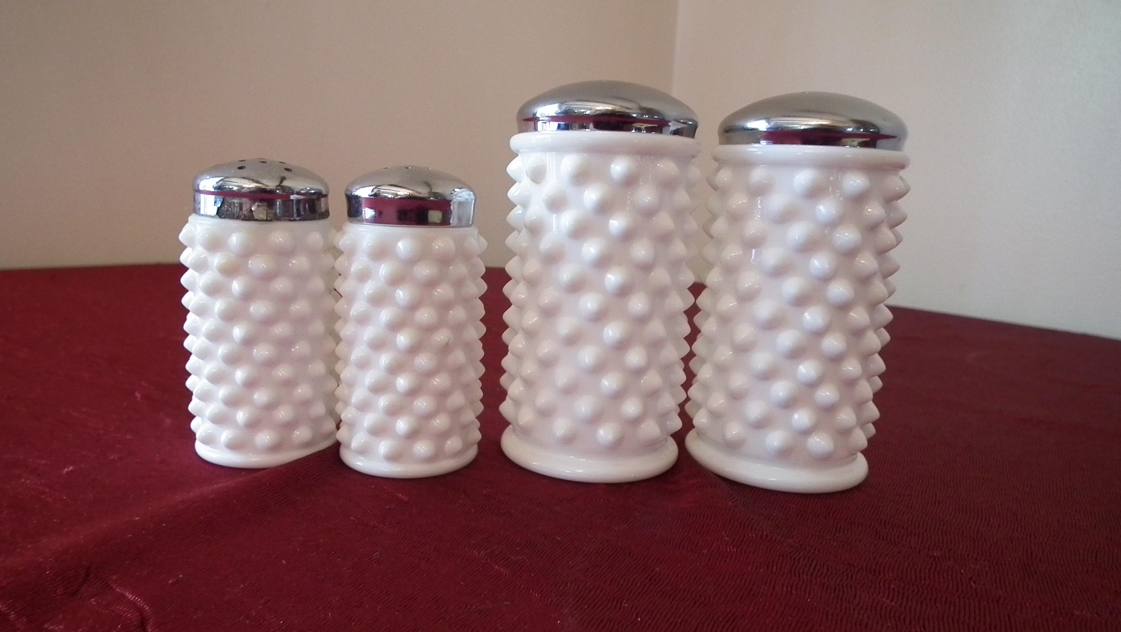 Fenton, 2 sets of white hobnail salt & pepper shakers, tin tops, unmarked, set A/B = 4 1/2” x 2”. se