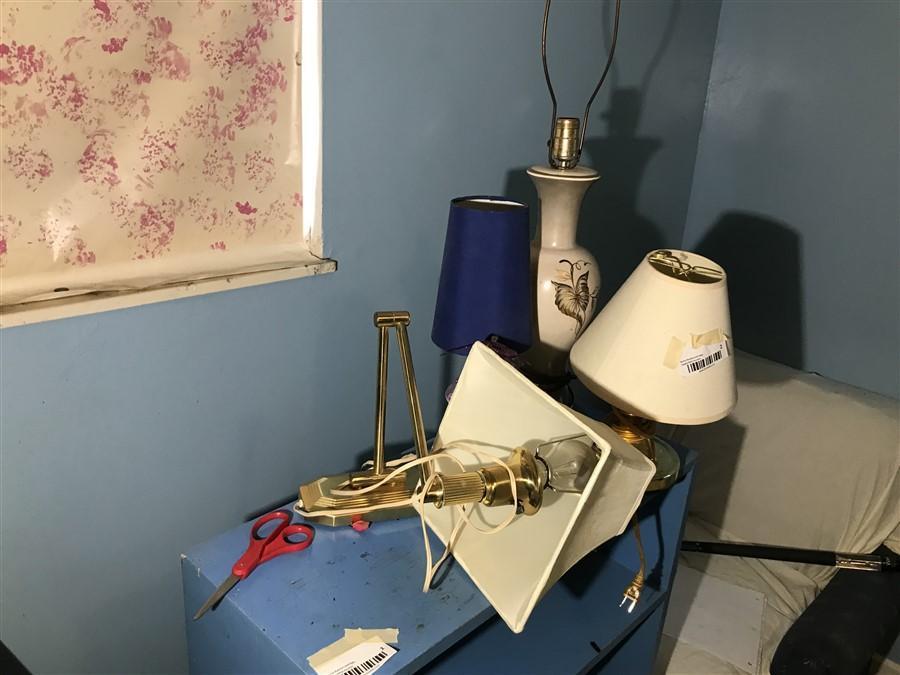 Group of Lamps on top of shelf