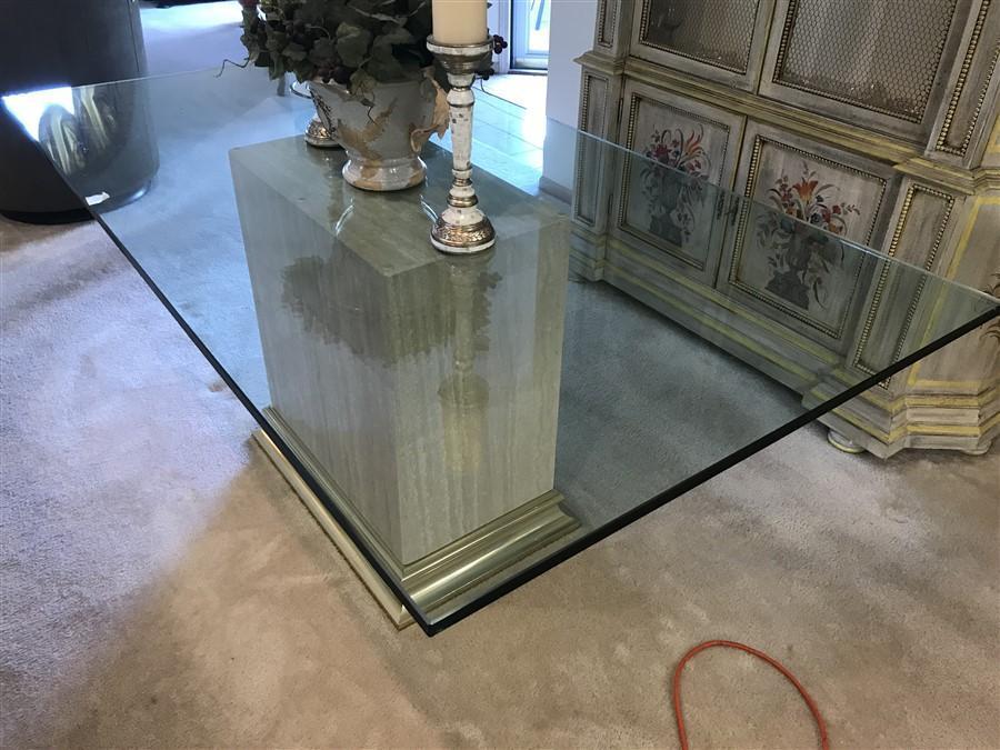 High end glass table on marble base