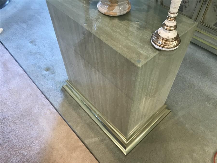 High end glass table on marble base