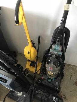 Group of 4 Vacuum Cleaners and a Sweeper