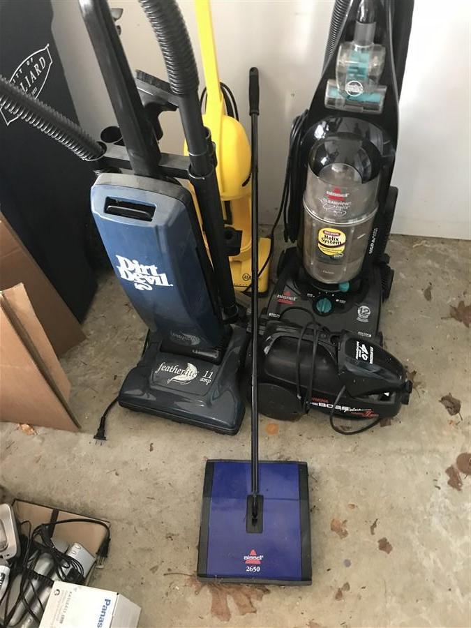 Group of 4 Vacuum Cleaners and a Sweeper