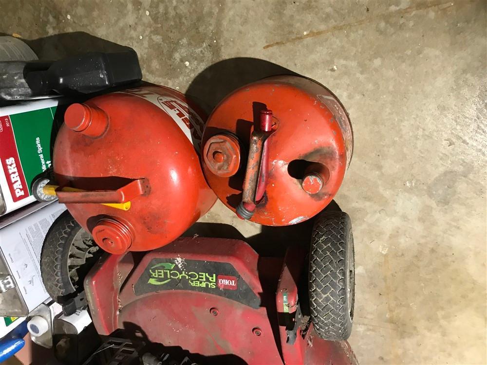 Push Lawn Mower and Two gas cans