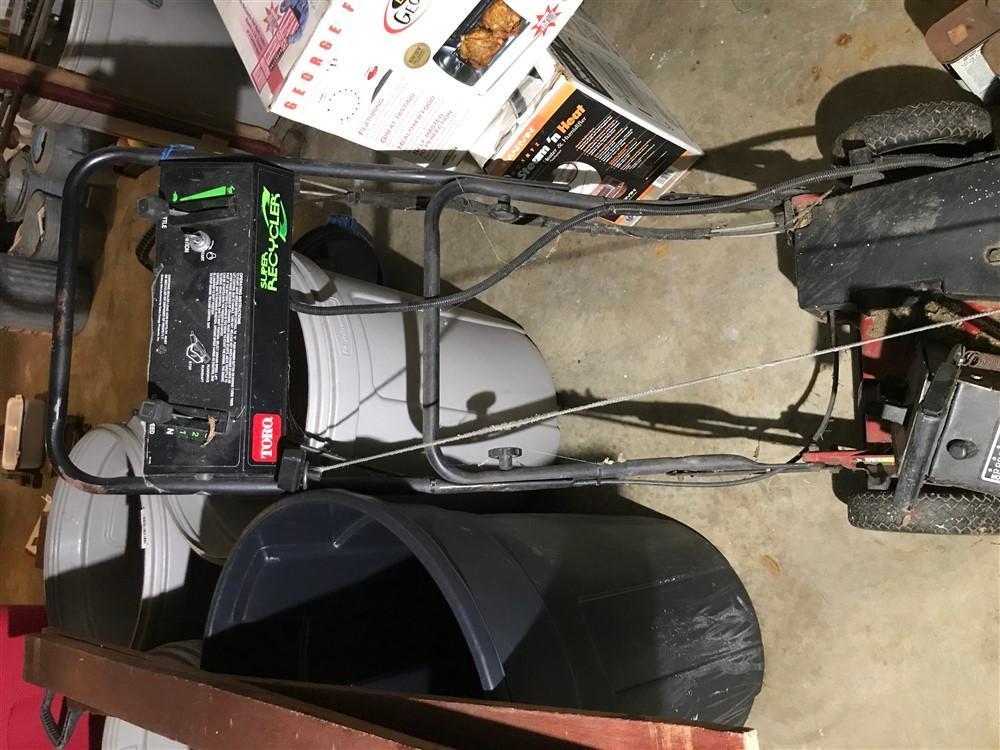 Push Lawn Mower and Two gas cans