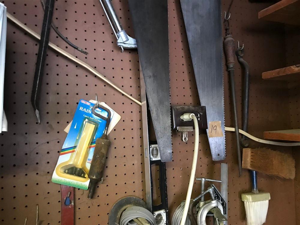 Group Lot Tools on Wall Antique Saws etc