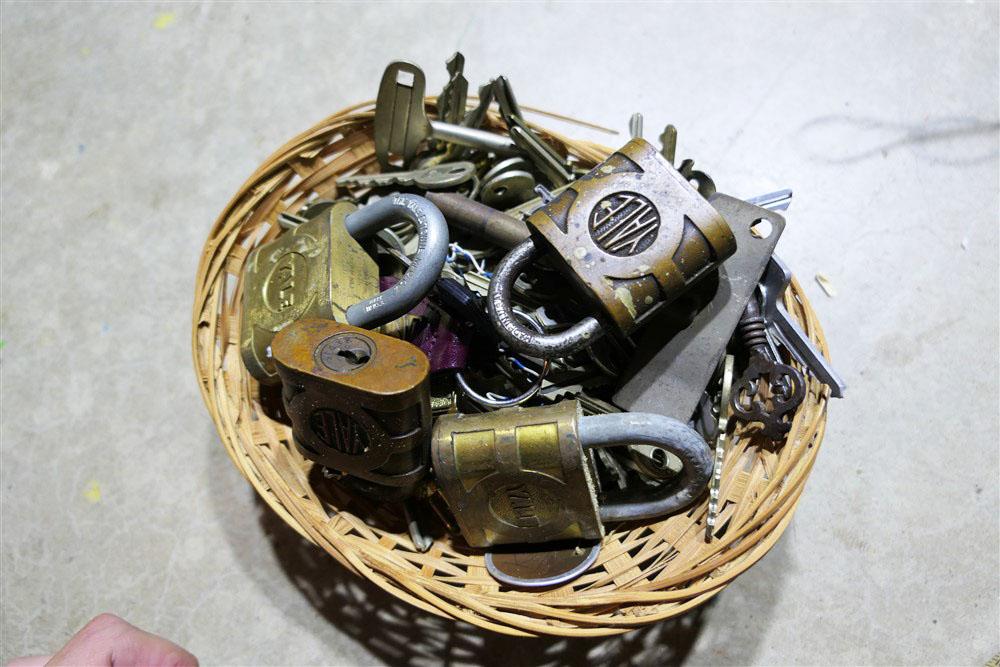 Basket full of assorted locks and keys