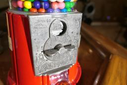 Metal and glass vintage style gumball machine