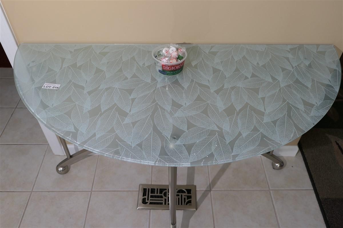 Floral pattern glass topped demi-lune table