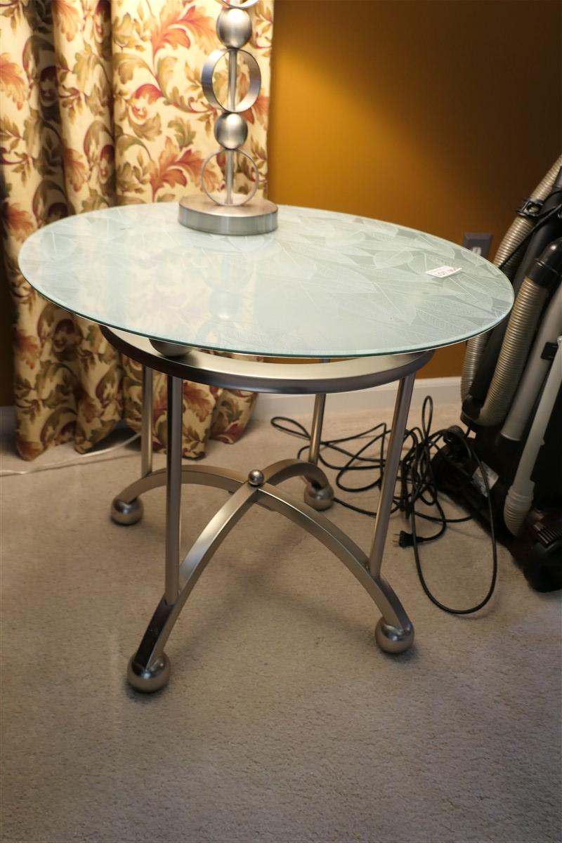 Pair of modern glass topped Leaf pattern lamp tables