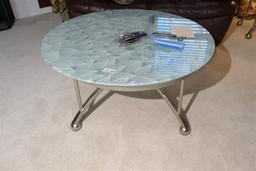 Glass topped leaf pattern coffee table