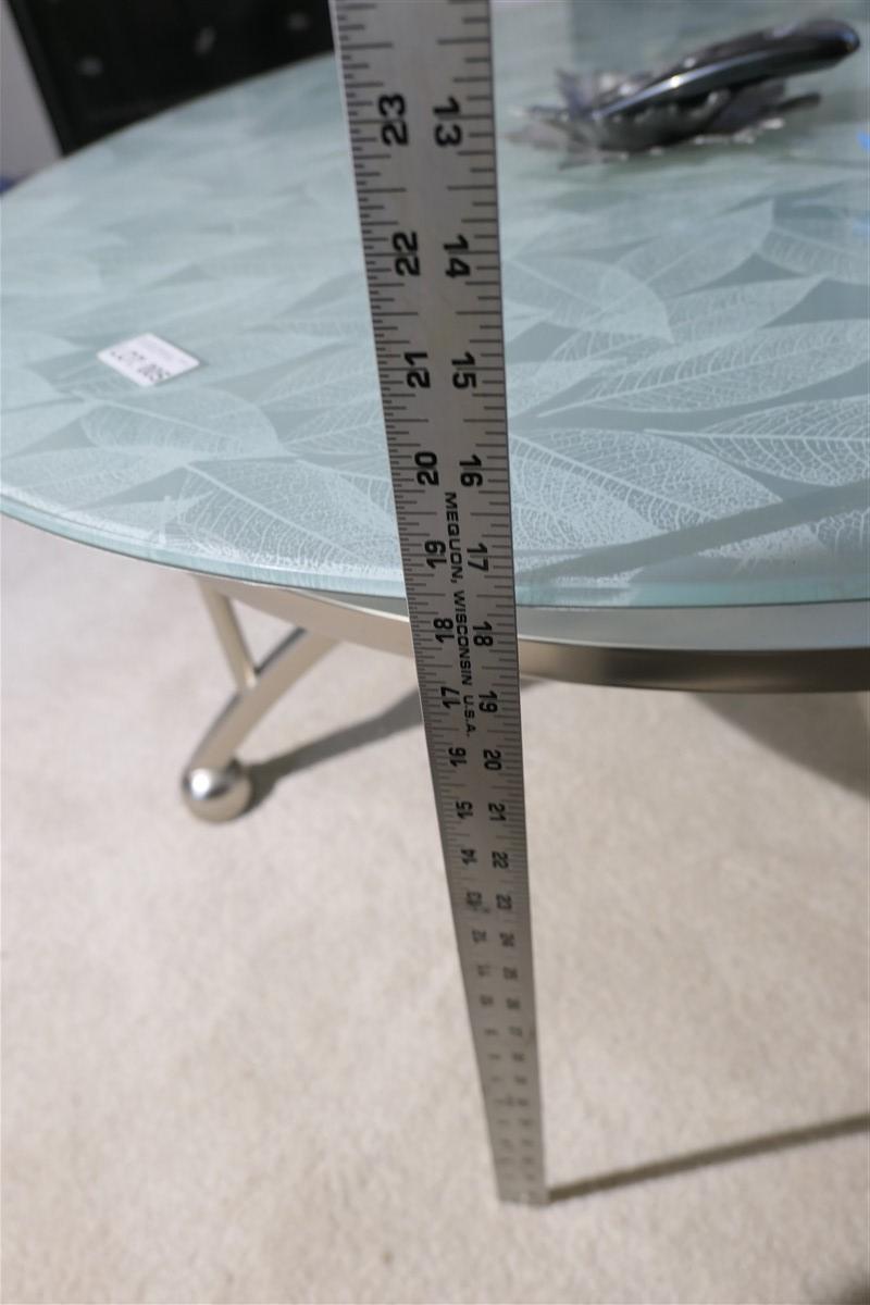 Glass topped leaf pattern coffee table