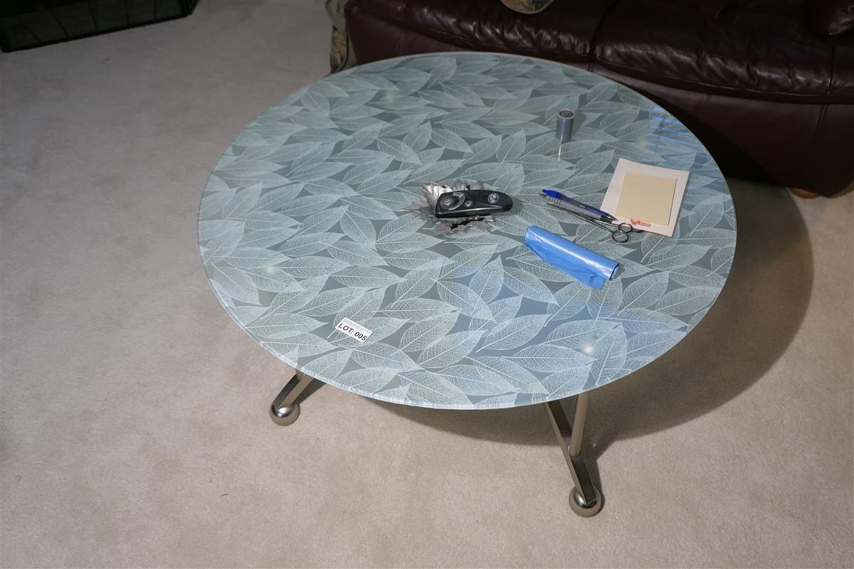 Glass topped leaf pattern coffee table