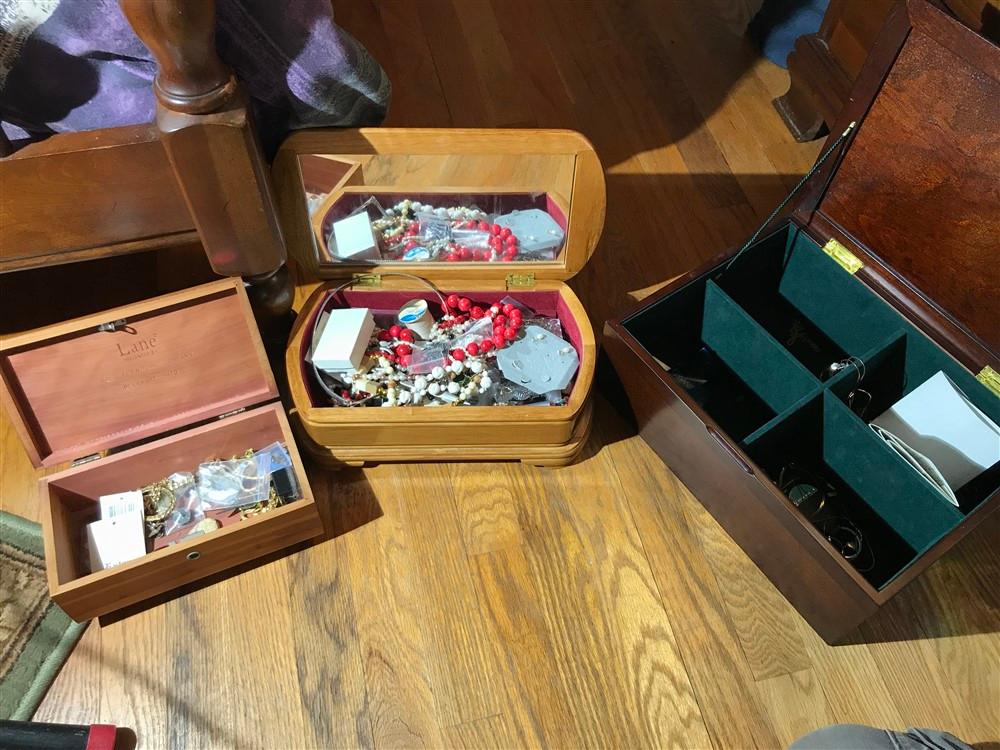 Three jewelry boxes and contents