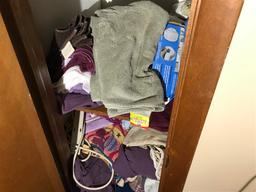 Contents of hall closet, towels, medical