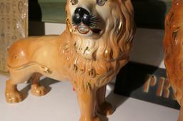 Pair of 19th c. Staffordshire Lions