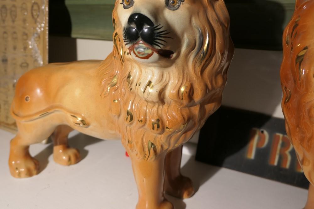 Pair of 19th c. Staffordshire Lions