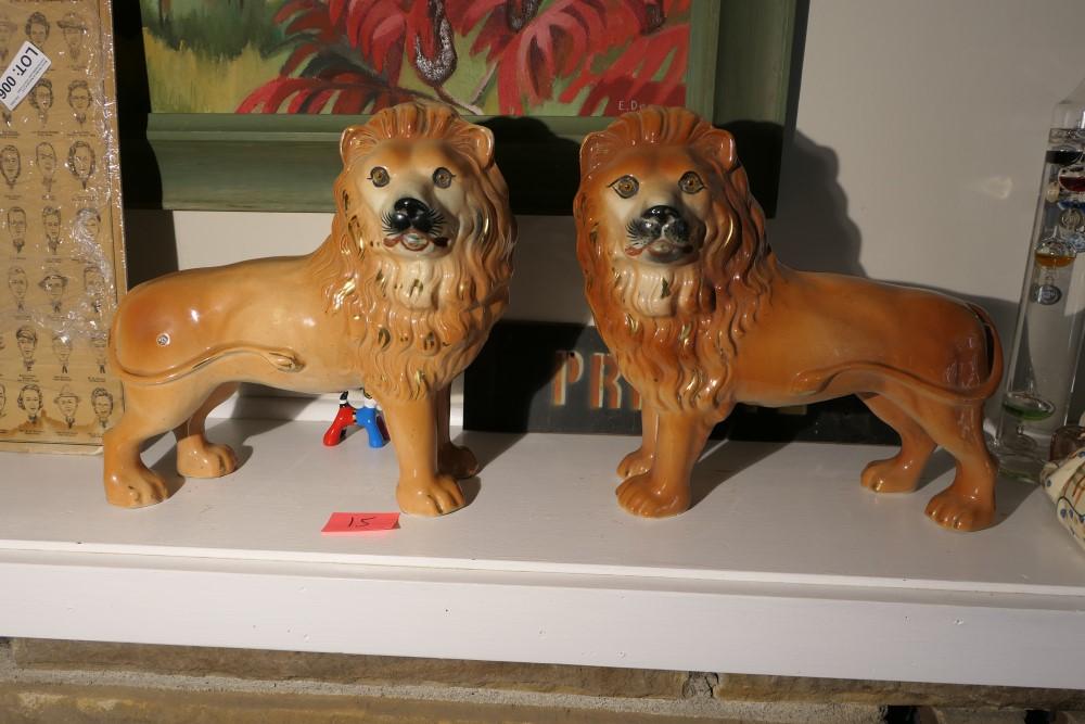Pair of 19th c. Staffordshire Lions