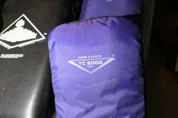 Four medium sized fight training bags, one larger