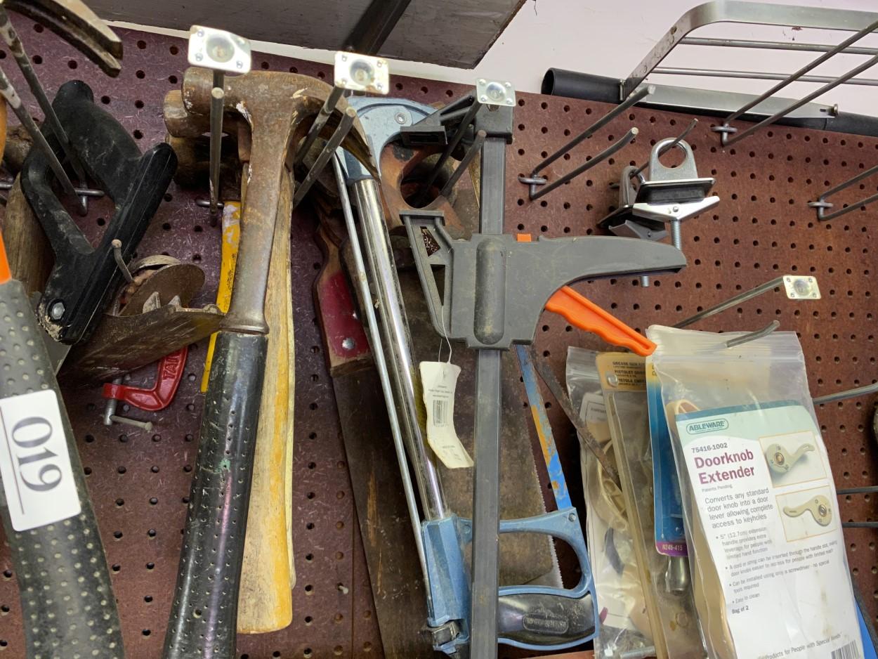 Large lot assorted tools on wall