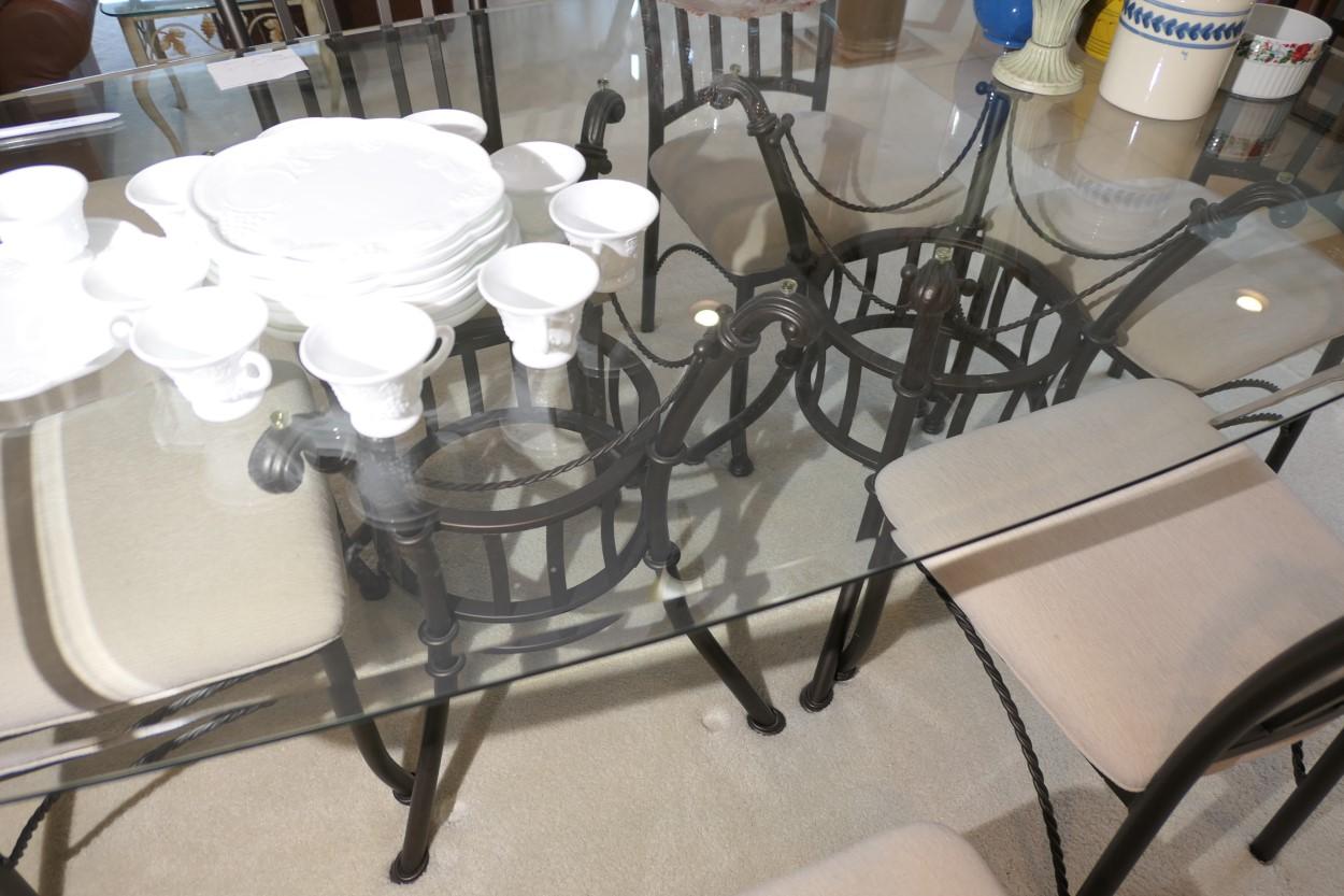 Glass topped table and set of six dining chairs