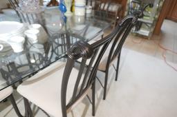 Glass topped table and set of six dining chairs