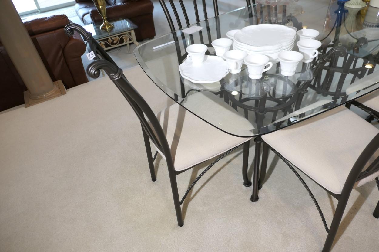 Glass topped table and set of six dining chairs