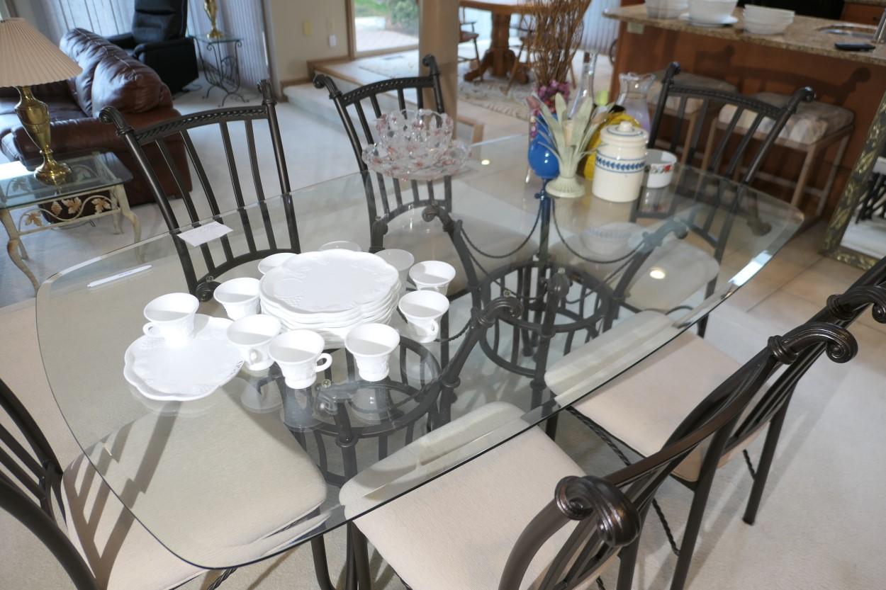 Glass topped table and set of six dining chairs