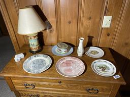 Collector plates, lamp etc on dresser