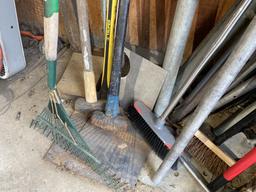 Corner lot of assorted hand tools