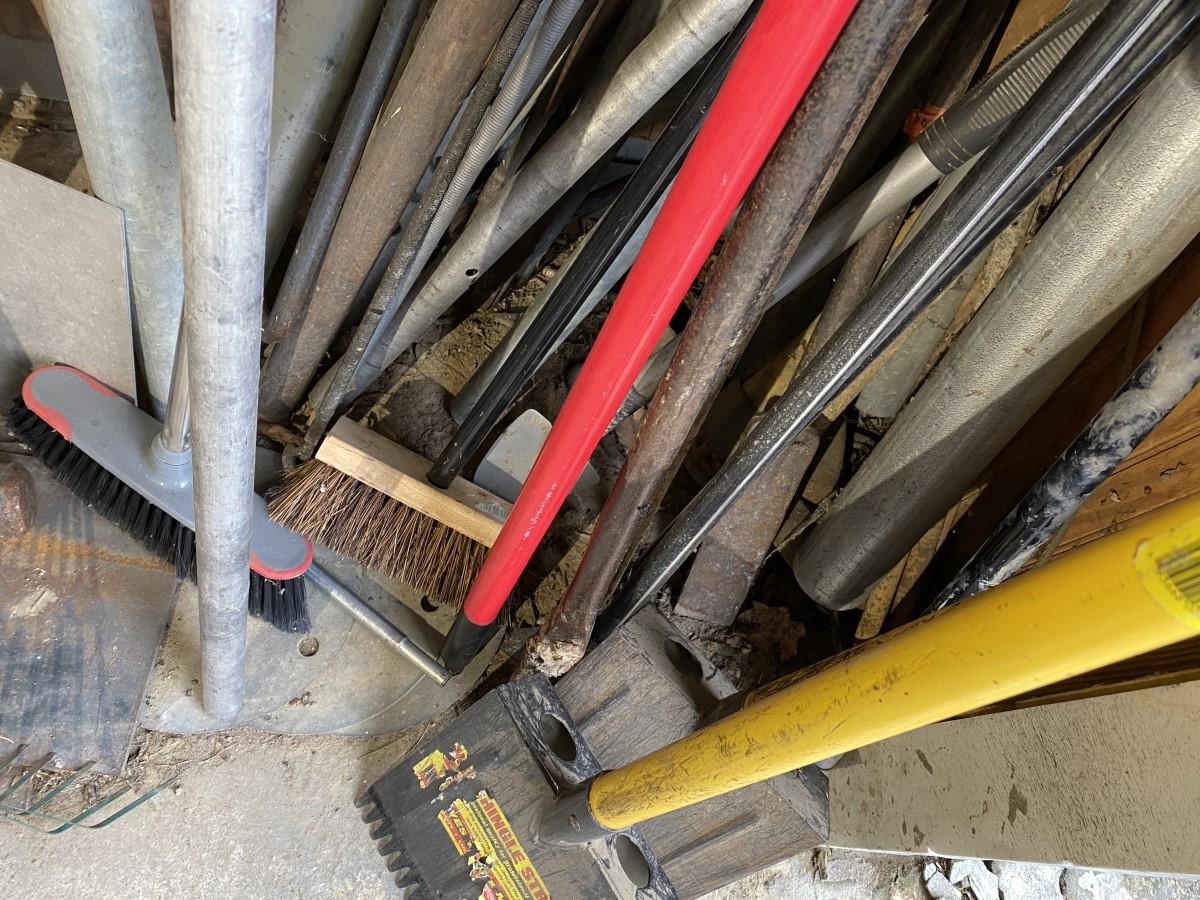 Corner lot of assorted hand tools