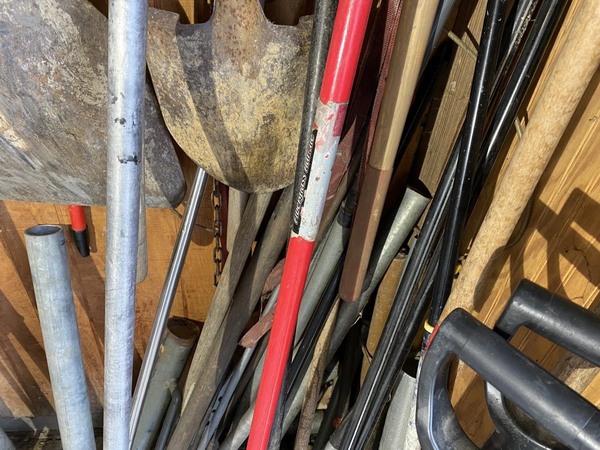 Corner lot of assorted hand tools
