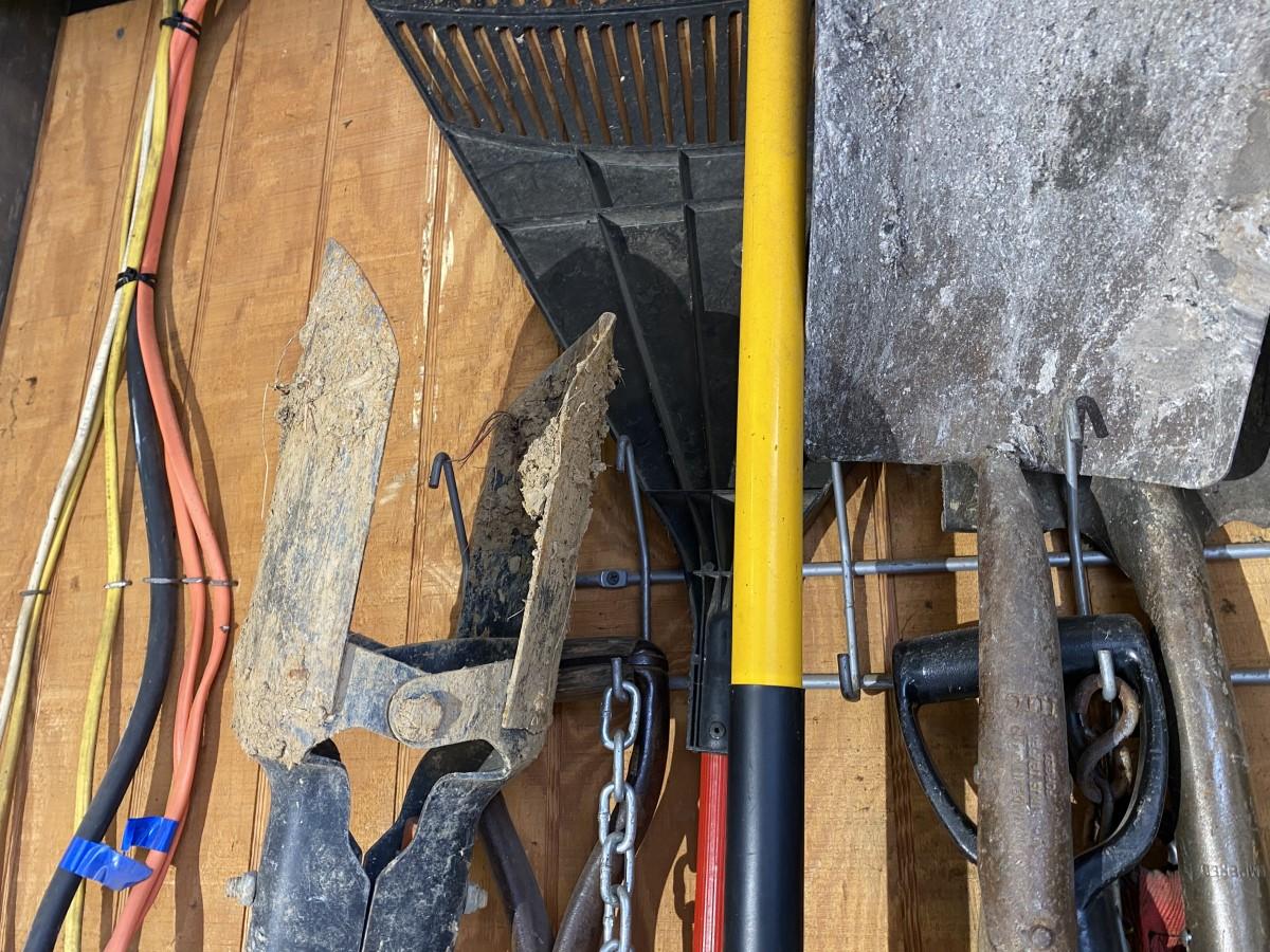 Corner lot of assorted hand tools