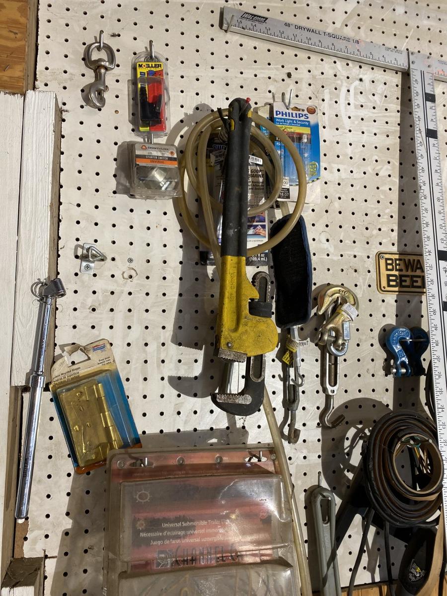 Wall lot of assorted tools, garage items