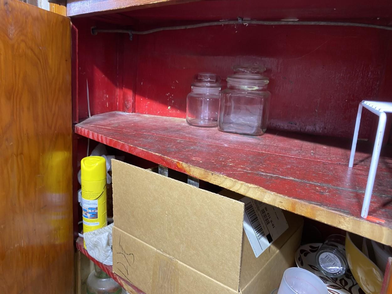 Contents of kitchen cabinets including Pyrex