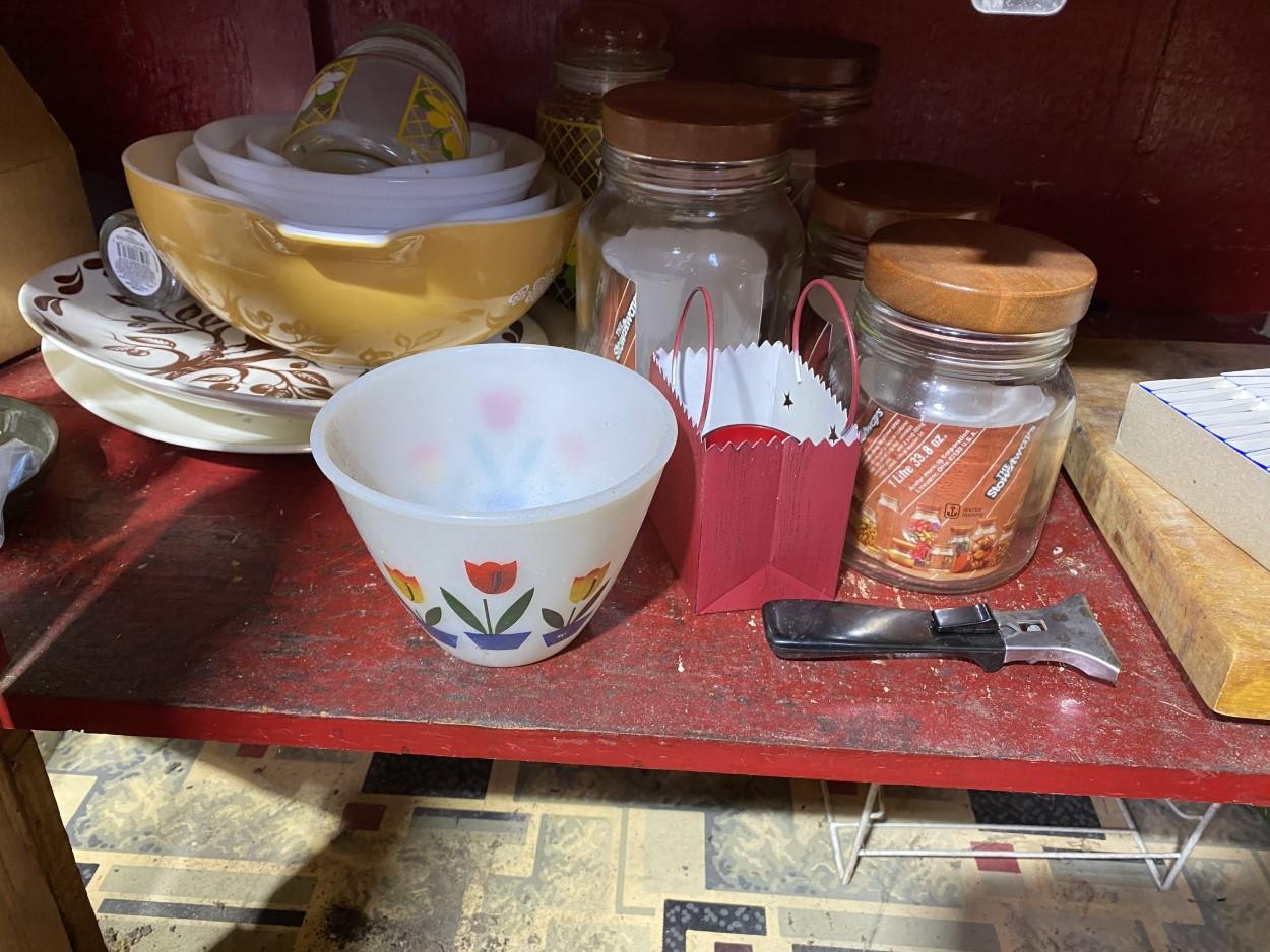 Contents of kitchen cabinets including Pyrex