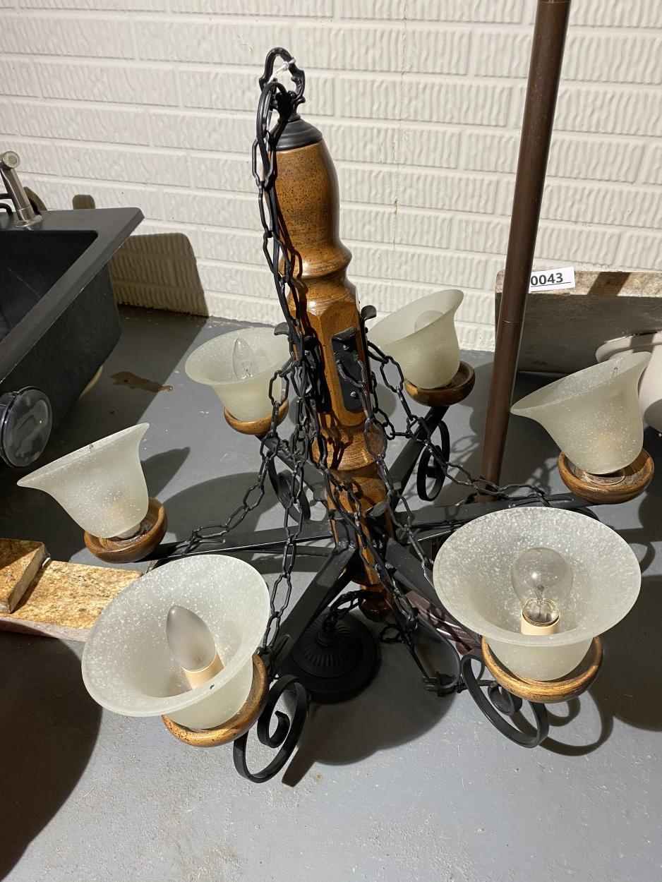 Nice sink with marble top, chandelier etc