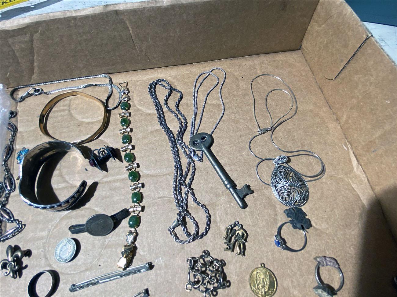 Lot of vintage jewelry including many pieces of sterling silver