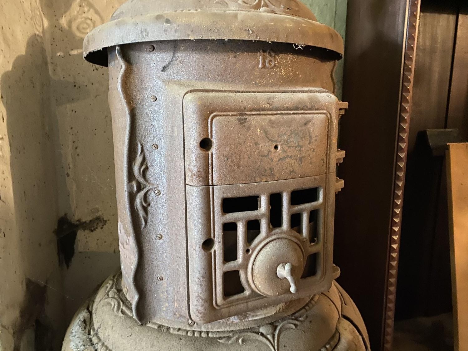 Large old antique pot belly stove