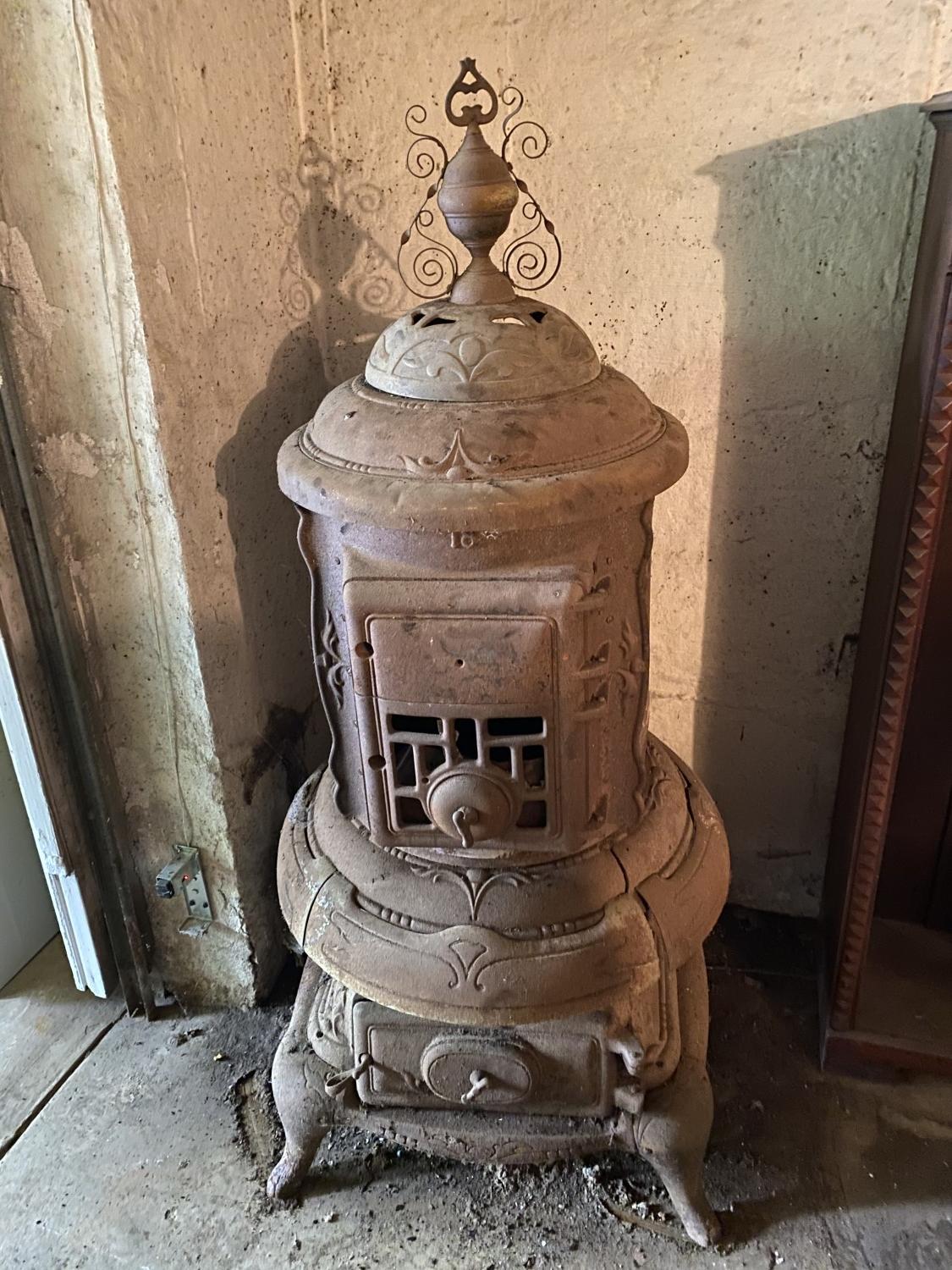 Large old antique pot belly stove