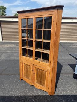 Antique Corner cupboard with old glass