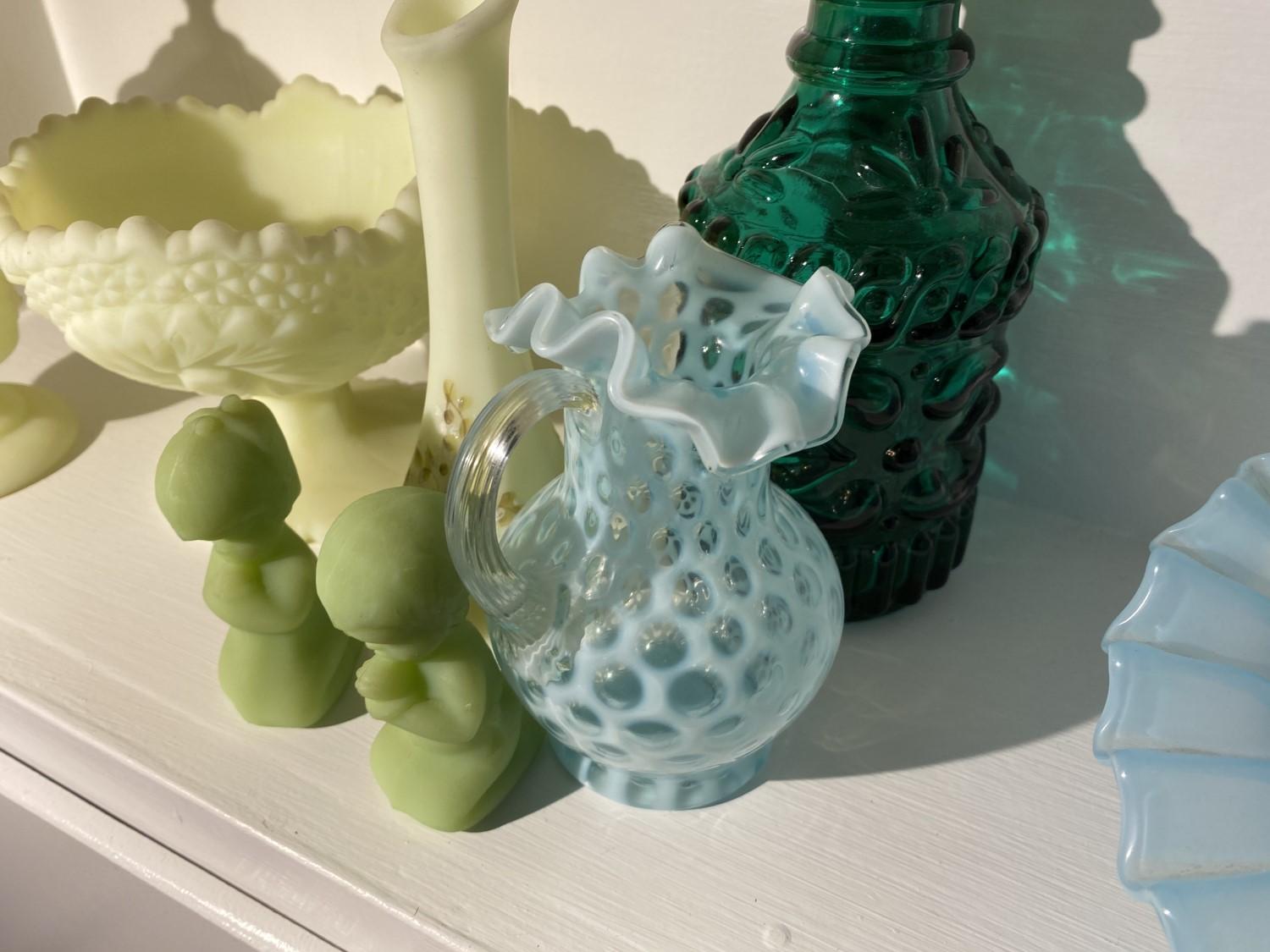 Shelf lot of mostly vintage Fenton glass