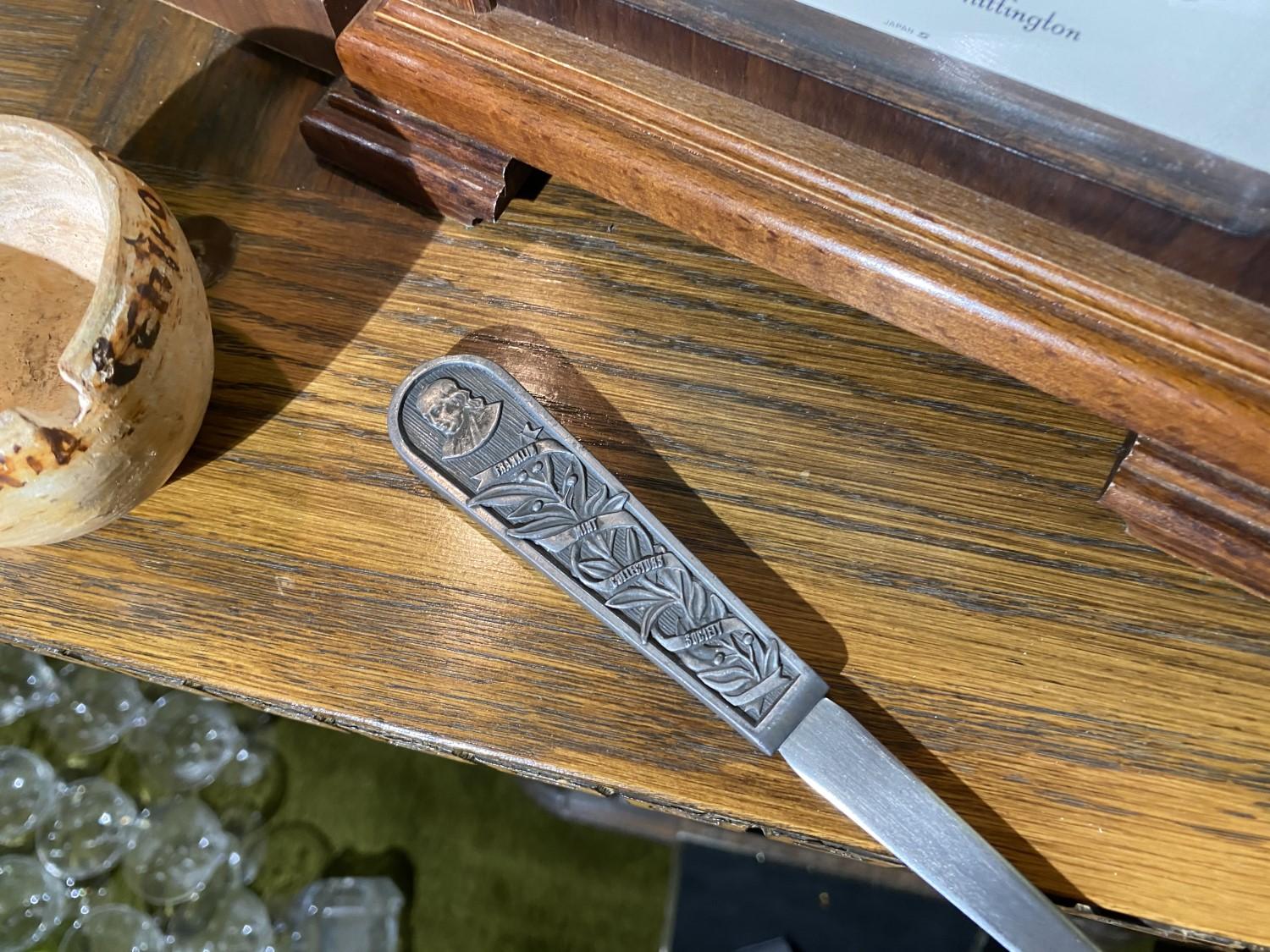 Matches, clock and other items on desk