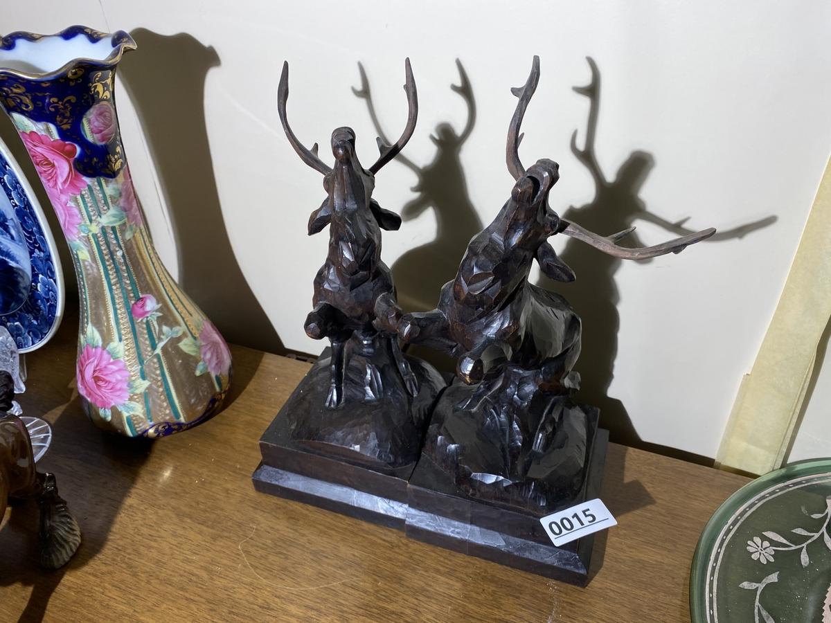 Pair of wooden Black Forest carved elk or deer bookends