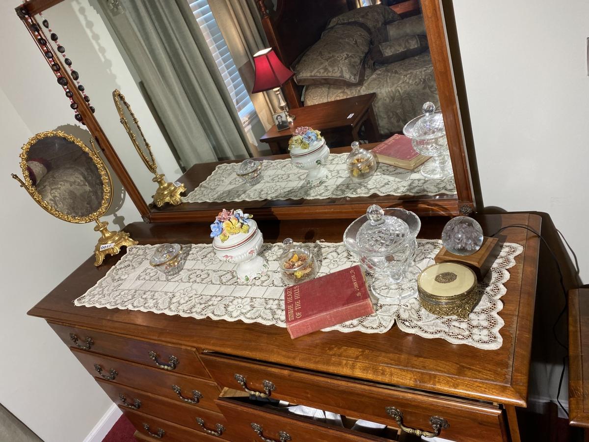 Items on bureau including elaborate mirror on stand