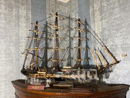 Vintage model ship and fine glass ships in bottles