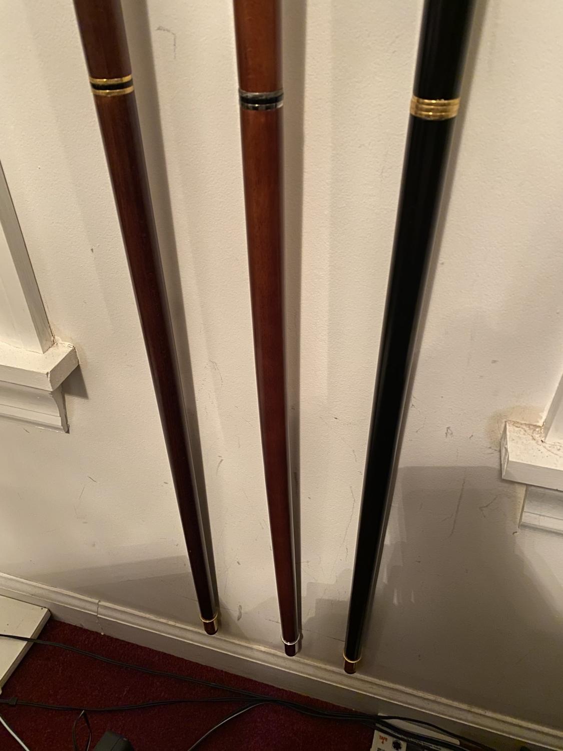 Group lot of three vintage canes