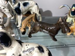 Large grouping of better mostly European ceramic dogs