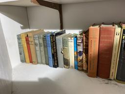 Contents of cupboard - assorted old books