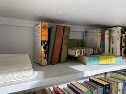 Contents of cupboard - assorted old books